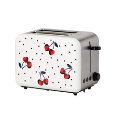 a white toaster with cherries painted on the front and sides, sitting on a white surface