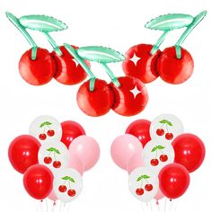 balloons and cherries are arranged in the shape of cherry's on a white background