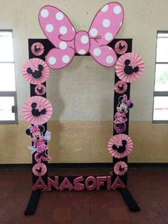 a minnie mouse frame with the name anasofia on it and a pink bow