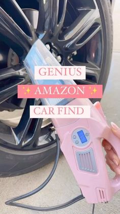 a person holding an electric car washer in front of a wheel with the words genius amazon car find