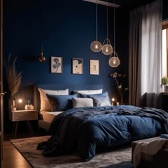 a bedroom with dark blue walls and white bedding