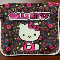 2003 Hello Kitty Messenger Bag, Bookbag, Backpack. Has A Pink Adjustable Strap At The Top And Fastens With Velcro On The Inside Of The Front Flap. Fits A 13” Macbook A Side Pouch To Hold Water Bottles, Etc. See Pics/Vid For Better Description And Approx. Measurements. (Note Bag On Vid Is The Same Size And Measurements Just Different Design) #Hellokitty #Sanrio #Powerpuffgirls #Strawberryshortcake #Messengerbag Pink Hello Kitty Print Bag For Back To School, Pink Rectangular Backpack With Cat Design, Pink Hello Kitty Print Standard Backpack, Pink Hello Kitty Print Backpack, Pink Cat Design Rectangular Backpack, Black Hello Kitty School Bag, Pink Cat Design Shoulder Bag For School, Pink Hello Kitty Standard Backpack, Pink Hello Kitty Backpack