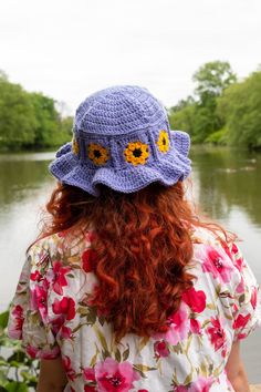 This hat is made of sunflower granny squares and finished off with an adorable ruffled brim that will shade your eyes from the sun as you enjoy a day at the park, up a tree, or at the beach!  It is handmade to order out of 100% acrylic yarn. Handmade Spring Sun Hat, Handmade Sun Hats For Spring, Whimsical Adjustable Crochet Hat For Beach, Whimsical Summer Crochet Bucket Hat, Handmade Whimsical Crochet Hat For Summer, Handmade Whimsical Summer Bucket Hat, Whimsical Crochet Bucket Hat For Beach, Whimsical Summer Crochet Hat With Curved Brim, Whimsical Crochet Bucket Hat For The Beach