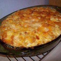 a casserole dish sitting on top of a metal rack