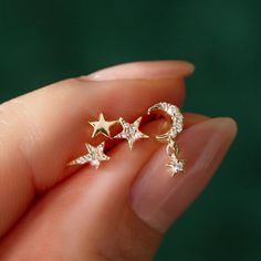 This TINY Double Star combo features one pave diamond star with another high polished gold star. Too small to wear on your first hole, but great for your second piercing and up! Sold as a single earring. 14K Solid Gold Ethically sourced Diamonds Hypoallergenic, Lead and nickel free Height 7mm x Width 4mm Carat:0.02ct, Clarity SI 1-2 Post Earring Length 9mm 14K Gold Butterfly backing #ED135-Gx1 Second Piercing, Moon Studs, Tiny Star, Tiny Diamond, Diamond Star, Gold Butterfly, Star Studs, Gold Star, Single Earring