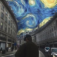 a man is taking a picture of the starry night