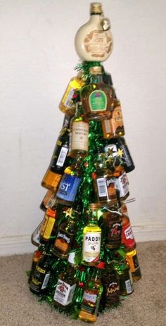 a christmas tree made out of beer bottles