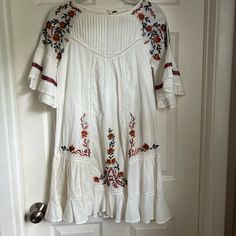 Lovely Embroidery Vintage Linen Dress. Dress Is New, Tags Attached, Never Worn. Amazingly Versatile And Gorgeous For A Summer Occasion, Wedding Or That Special Get Together. Dress Is Linen Fabric With Ruffled Bottom- Sleeves Has Beautiful Embroidery And Dress Is Fully Lined. Embroidered Short Sleeve Mini Dress For Brunch, Casual Cotton Boho Dress With Floral Embroidery, Floral Embroidered Mini Dress With Short Sleeves For Brunch, Cotton Mini Dress With Floral Embroidery For Brunch, Floral Embroidered Short Sleeve Mini Dress For Brunch, Short Sleeve Mini Dress With Floral Embroidery For Brunch, Floral Embroidered Cotton Mini Dress For Brunch, Embroidered Knee-length Mini Dress, White Floral Embroidered Knee-length Dress