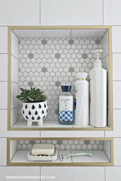 bathroom shelves with soap, toothbrushes and other items