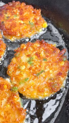 some fried food is cooking in a frying pan