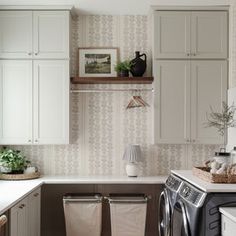 a washer and dryer in a small kitchen