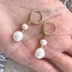 Classic dainty real natural pearl dangle earrings with gold hoop clip-on huggies. 7mm and 5mm ivory freshwater pearls have beautiful natural shine, every pearl is unique in its texture and shape, super elegant and classic. Great accessory for bridal bridesmaid wedding earrings, amazing gift idea for your loved one, they also look perfect with everyday outfit! 💎 Features: ♥ Material:14K Gold plated sterling silver, brass ♥ Main stone: 5mm, 7mm natural freshwater pearl, each pearl is unique ♥ Clip-on Closure 💎 Details: ♥ Approximate Measurements: - Length: 3.4 cm - Width: 1 cm ♥ Lightweight, easy to wear ♥ Nickel/Lead Free, Hypoallergenic, good for sensitive skins 🎁 Packing & Shipping: ♥ All our jewelry will be shipped with beautiful gift wrap packaging ♥ Handwrite gift notes/cards availa Pearl White Dangle Earrings With Pearl Chain, Akoya Pearl Drop Earrings In Pearl White, Akoya Pearl Drop Dangle Earrings, Pearl Drop Earrings With Pearl Charm, Delicate Pearl Earrings With Pearl Pendant, Delicate Pearl Hoop Earrings With Pearl Charm, Delicate Pearl Earrings With Pendant, Delicate Pearl Huggie Hoop Earrings, Hypoallergenic Pearl White Pearl Earrings For Wedding