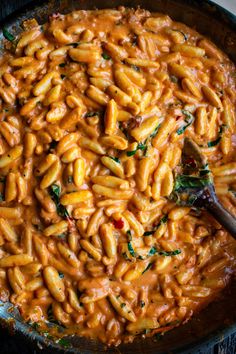 a skillet filled with macaroni and cheese