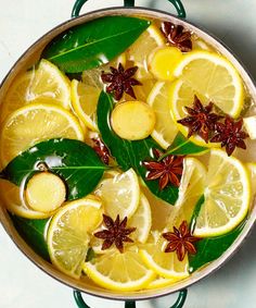 a pan filled with lemons and spices