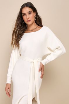 The Lulus Cozy Captivation Ivory Ribbed Dolman Sleeve Midi Sweater Dress is perfect for looking a little extra flirty while sitting fireside this season! Stretchy, ribbed sweater knit shapes a flattering boat neckline and dolman-style sleeves with fitted cuffs. A matching tying sash cinches at the waist of the figure-flaunting bodycon silhouette, that falls to a midi hem with side seam slits. Fit: This garment fits true to size. Length: Mid-calf length. Size medium measures 50.5" from shoulder t Formal Sweater, Off The Shoulder Sweater Dress, Ivory Sweater Dress, Sweater Midi Dress, Cozy Sweater Dress, Midi Sweater Dress, Dolman Sleeve Sweater, Ivory Sweater, Lulu Fashion