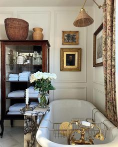 a bath room with a tub and a shelf