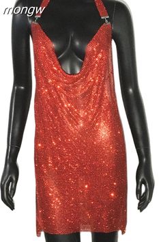 a mannequin with red sequins on it's torso and back