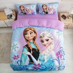 a bed with two frozen princesses on it