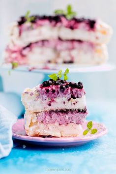 two pieces of cake sitting on top of a pink plate next to another piece of cake