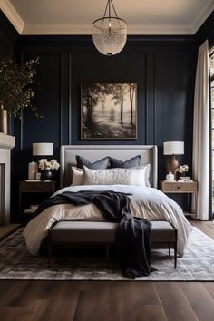 a bedroom with dark blue walls and white bedding in the center, along with a chandelier