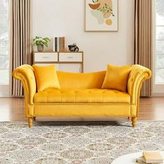 a living room with a yellow couch and rug