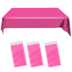 a pink table cloth and three pieces of plastic