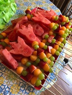 watermelon and grapes on skewers with lettuce