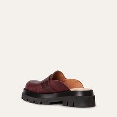 This sophisticated slip-on shoe features a stylish buckled strap and is crafted from premium plum leather. Combining elegance with ease, the Gloria loafer offers a chic and comfortable option for any occasion. Designed in Sweden, handcrafted in Portugal. Heel height 5 cm/ 1,97 in True to size Slipper Shoes, Shoe Care, Low Heels, Slip On Shoes, Plum, Clogs, Heel Height, High Heels, Slippers