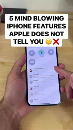 a person holding an iphone with the text 5 mind blowing iphone features apple does not tell you