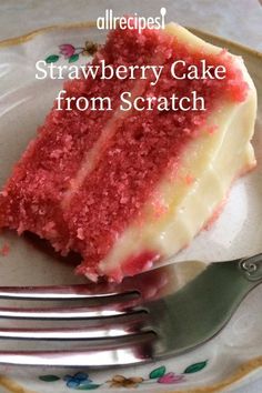 a piece of strawberry cake on a plate with a fork