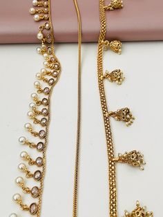 Get the simple and elegant kamarpatta that goes with your saree, half saree or even jeans with crop tops. The possibilities are endless .  This is free size and will easily fit sizes 4 to 16 . 4 options are available. Pattern1: Kundan and pearls Patttern 2 : simple and trendy gold plated snake chain . Perfect for jeans and crop top look! Option3 : Jhumka style all gold plated Option 4: Moti / Pearl chain gold plated  Easily adjustable.  The gold plated design Traditional Waist Chain With Latkans For Festive Occasions, Traditional Festive Waist Chain With Latkans, Festive Waist Chain With Latkans For Festivals, Traditional Waist Chain With Latkans For Festivals, Bollywood Style Tilla Waist Chain For Festivals, Festive Latkans Waist Chain For Wedding, Traditional Waist Chain With Tilla For Party, Traditional Tilla Waist Chain For Party, Bollywood Style Waist Chain With Tilla For Festive Occasions