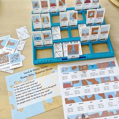 a table with several cards and instructions for making a water form game on it,