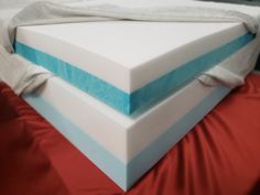 three mattresses stacked on top of each other