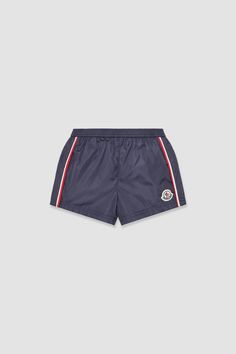 Crafted from nylon technique, these swim shorts come with an elasticized waistband that provides comfort and freedom of movement. The swim shorts are embellished with side piping in a contrast hue and a logo patch. Blue Sporty Swim Trunks For Playwear, Sporty Athletic Shorts For Pool, Blue Beachwear Bottoms For Playwear, Sporty Swim Trunks For Playwear, Sporty Short Swim Trunks For Playwear, Parka Vest, Cardigan Shirt, Jacket Parka, Cotton Baby