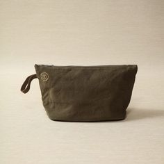 Cotton canvas pouch with bass zipper in bronze 32cm W x 13cm D x 18cm H Leather accent Canvas Travel Pouch With Zipper, Canvas Cosmetic Bag With Removable Pouch, Brown Canvas Bag With Zipper Pouch, Everyday Canvas Pouch With Zipper Closure, Everyday Canvas Cosmetic Bag With Zipper Closure, Circle Outline, Zippered Pouch, Bag Icon, Canvas Pouch