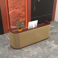 an office desk with a plant on it in front of a door