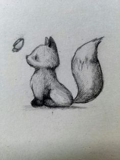 a pencil drawing of a squirrel sitting on the ground with a leaf in its mouth