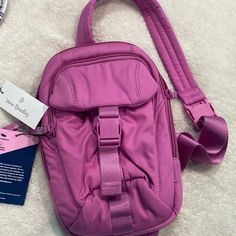 Vera Bradley Utility Sling Backpack, “Rich Orchid (Pink)” From Daily Errands To Vacation Days, This Clever Style Will Be The Very First Thing You Reach For. Perfectly Placed Pockets Keep Everything You Need Close And Secure. Made From Sleek, Water-Repellent Polyester Bag Can Be Worn As Sling Backpack, Or As Belt Bag Exterior Features Front Flap Pocket With Buckle, Zip Pocket, Main Compartment And Hidden Back Zip Pocket Interior Features One Slip Pocket And One Zip Pocket Zip And Buckle Closures. Versatile Pink Softback Bag, Pink On-the-go Bag With Adjustable Straps, Pink Rectangular Shoulder Bag With Adjustable Straps, Versatile Pink Rectangular Backpack, Versatile Pink Backpack, Versatile Rectangular Pink Backpack, Versatile Pink Standard Backpack, Casual Pink Shoulder Bag With Adjustable Straps, Pink Travel Shoulder Bag Backpack