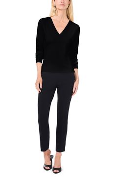 This sleek and classic V-neck top is cut from ultrastretchy body-sculpting fabric that shows off your natural shape. 24" length V-neck Long sleeves 90% polyester, 10% spandex Machine wash, tumble dry Imported Chic Stretch V-neck Top For Work, V-neck Tops With Seamless Collar For Work, Fitted V-neck Tops For Business Casual, Sleek Stretch Tops For Workwear, Sleek Stretch Tops For Work, Stretch V-neck Top For Work, Seamless Elastane V-neck Tops, Fitted V-neck Sleek Top, Seamless V-neck Elastane Top