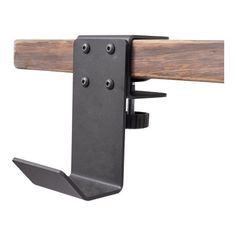 a close up of a metal hook on a wooden rail with two screws attached to it