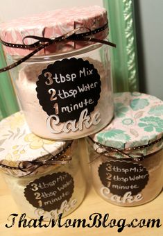 three jars are stacked on top of each other with labels in the bottom one is labeled 3lbs mix 1 minute cake