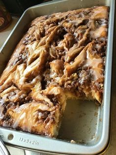 a pan filled with cake sitting on top of a counter