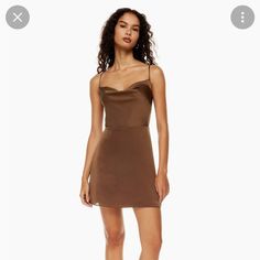 Fyi - The Dress Is Not The Silk Material In The Cover Shot, But Is The Same Style. Brand New Size Small Dress With Tags, Never Worn! Fits A Size 4-6 Simple Brown Mini Dress, Brown Short Dress, Brown Hoco Dress, Brown Satin Mini Dress, Brown Homecoming Dresses, Brown Aritzia Dress, Brown Fitted Button-up Mini Dress, Short Brown Dress, Elegant Brown Button-up Mini Dress