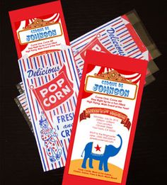 three red, white and blue popcorn bags with an elephant on the front are sitting next to each other