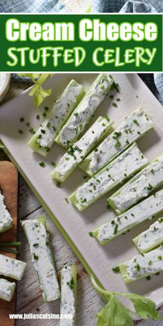 cheese stuffed celery on a cutting board with lettuce