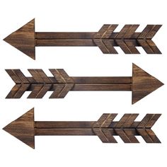 three wooden arrows pointing in different directions