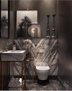 an instagram photo of a bathroom with marble walls and flooring, including a white toilet