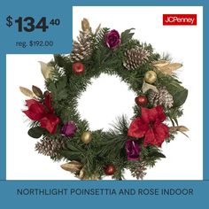 a christmas wreath with pine cones and poinsettis is on sale for $ 130 00