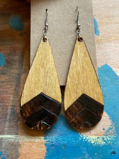 I design and wood-burn each piece by hand. Handmade Natural Wood Teardrop Jewelry, Handmade Teardrop Natural Wood Jewelry, Brown Teardrop Wood Jewelry, I Design, Teardrop Earrings, Moscow, Jewelry Earrings Dangle, Etsy Earrings, Dangle Drop Earrings