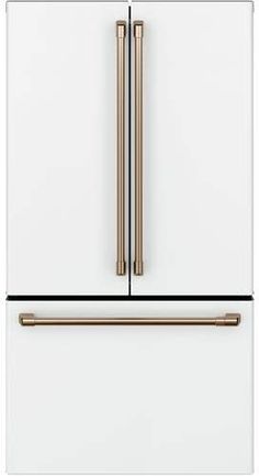 a white refrigerator freezer with two gold handles